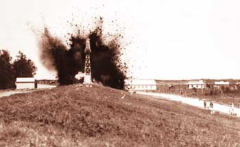 Dynamiting the Mississippi River levee in St. Bernard Parish, 1927 (Corps of Engineers photo)