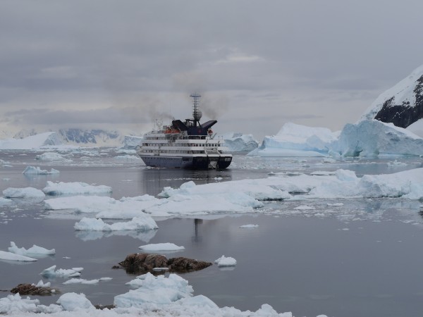 Vessel amidst sea ice, Neko Harbour