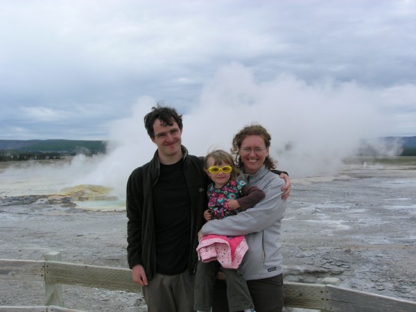 Allochthonous family looking the wrong way as a geyser does its thing